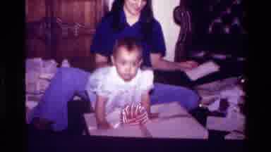 California USA (1977): Mom And Baby Sitting On The Floor Opening Card And Present