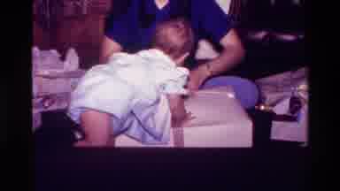 California USA (1977): Playing Baby In The Sitting Room