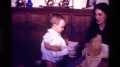 California USA (1977): Cute Baby Girl Gets A New Big Dressed Up Teddy Bear