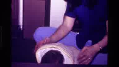 California USA (1977): The Mother Was Dressing The Baby But The Child Was Playing