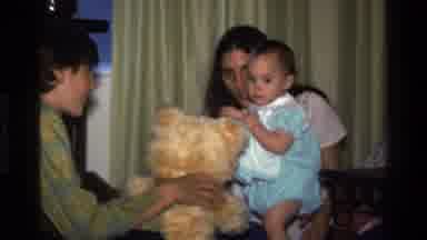 California USA (1977): A Night At Home With Family Playing With Baby Girl And