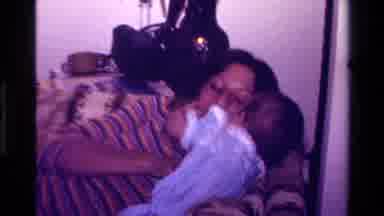 California USA (1977): Footage Of Mother Nurturing Newborn Baby In What Appears To