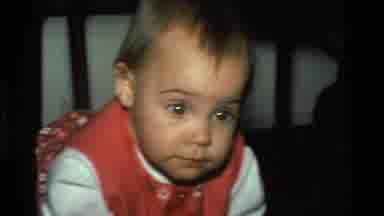 California USA (1977): A Cute Little Baby Crawling Through The House With A Little