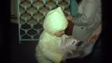 California USA (1977): Baby In Restaurant Looking At Menu And Having A Great Time