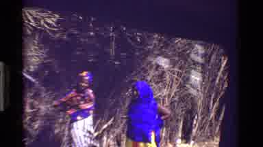 Kenya (1983): Two African Woman Stand Next To The Jungle And Watch The Cameras