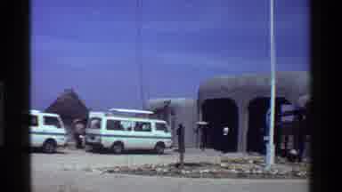 Kenya (1983): Vintage Video Of Sightseeing With Mini Tour Vans On A Clear Sky Day