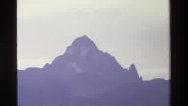 Kenya (1983): A Vast Mountainscape Covered In Snow During The Daytime