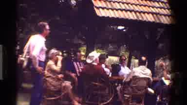 Kenya (1983): Family Sitting In Yard Having Conversation Near House