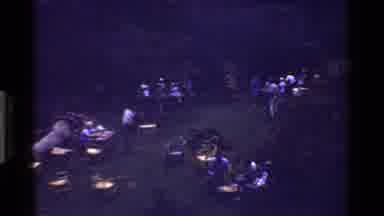 KENYA-1983: People Gathering at Camp in Woods with Chairs and Fire