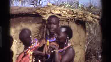 Kilaguni Kenya (1983): African People With Traditional Clothes Outside Their Hut
