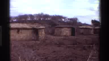 Kilaguni Kenya (1983): Shot Of Multiple Ancient Small Single Room Houses In A Dry