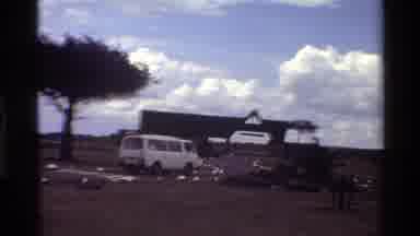 Mara Tanzania (1983): A Tourist Bus Approaching A Wildlife Visitor Lodge In The