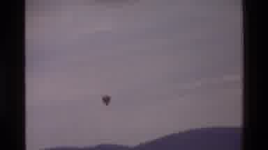 Mara Tanzania (1983): While 2 Wild Lions Roam In A Park 1 Balloon Fly Over