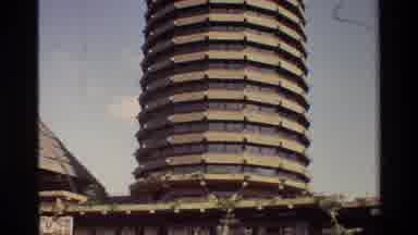 NAIROBI KENYA-1983: Very Tall Bege Round Building On A Sunny Day With Few Clouds