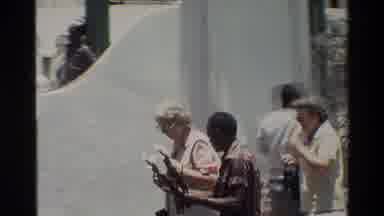 Nairobi Kenya (1983): A Man Trying To Sell Flowers In A Flower Market