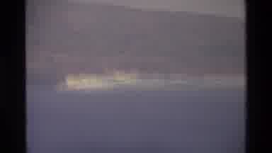Singapore (1984): Helicopter View Of An Island Followed By A Beach View Of The