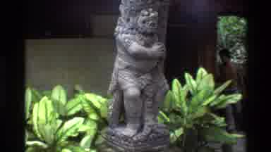 Singapore (1984): People Touring A Building With Unique Monuments And Statues