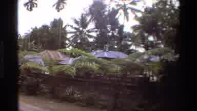 Singapore (1984): Camera Zooms In On The Top Of A Structure With An Interesting