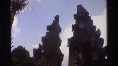 Singapore (1984): Vacationing Blonde Woman Admiring Large Religious Temple In