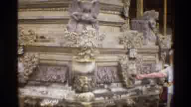Singapore (1984): Old Lady Checking Out An Interesting Cultural Statue With Angels