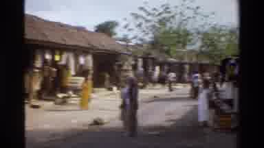 Singapore (1984): People Walking Around In Town And People Working In Fields