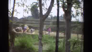 Singapore (1984): A Group Of People Walking And Chatting In The Ruins Of A City