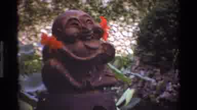 Singapore (1984): The Doll Is Smiling To The Flower And The Man Is Simply Doing