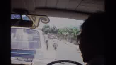 Singapore (1984): Man Wearing Glasses Driving On The Right Seat Stuck In Traffic
