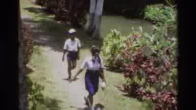 Singapore (1984): School Students Are Walking And One Lady Is Washing Clothes