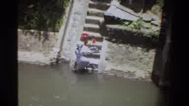 Singapore (1984): Locals Carrying Basket On There Heads As They Walk Through Water