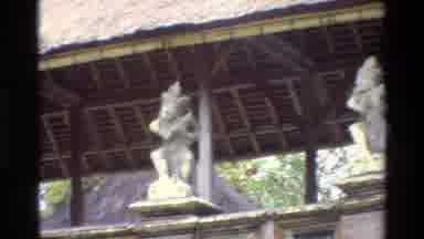 Singapore (1984): Interesting Marble Statues Shown On A Wall With Sign Nearby