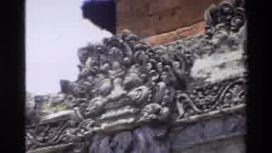 Singapore (1984): Tourist Visiting A Temple Shows Close Up Of The Detail Of The