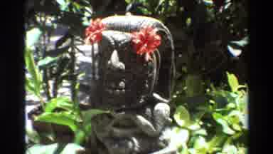 Singapore (1984): Ancient Statue With Flowers On The Head In Middle Of A Jungle