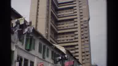 Singapore (1984): Green And White Building Vintage City Clothes Hanging Near