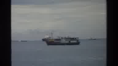 Singapore (1984): Large Ships Steaming By Factory Spewing Smoke Into The Air