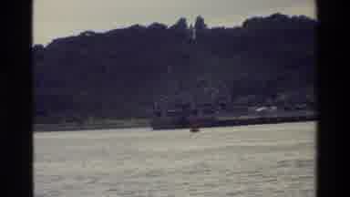 Singapore (1984): A Boat Docked At A Base For Boats In The Port Of Singapore
