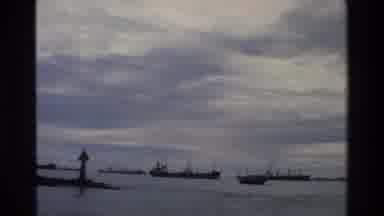 Singapore (1984): Footage Of Boat's Of Various Nature's Of Work Off The Coast Of