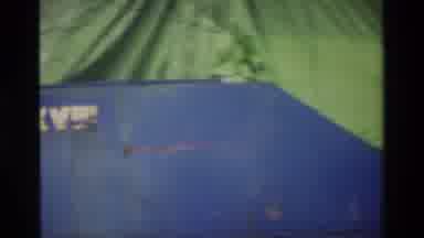 Singapore (1984): Blue Cargo Boat Covered By Green Tarp On A Clear Day