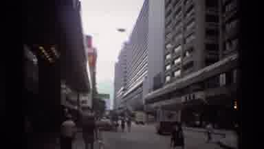Hong Kong (1984): Many People In The City Walking Around And Going Places