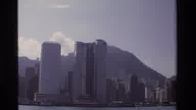 Hong Kong (1984): Panorama Of A City Skyline With Mountains In The Background