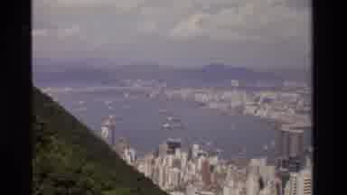 HONG KONG-1984: City Skyscrapers Close To The Sea And Green Mountains