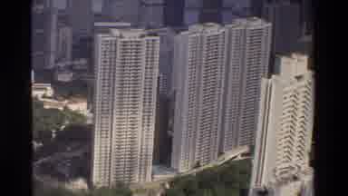 Hong Kong (1984): Drone Clip Of Buildings And A House On The Hill Next To De