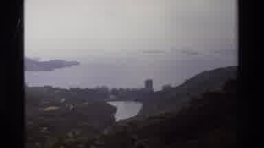 Hong Kong (1984): A Man Enjoying A Hiking Trail And A View Of The Ocean