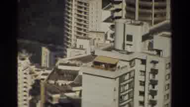 Hong Kong (1984): High Rise Buildings In A Large City Some Are Near Water With