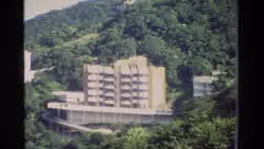 Hong Kong (1984): A View Of A Town's Buildings And Transportation
