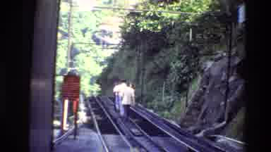 Hong Kong (1984): Men Walking On Railway Track View From Inside Tunnel