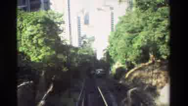 Hong Kong (1984): A Train Getting Ready To Go Through A Small Tunnel