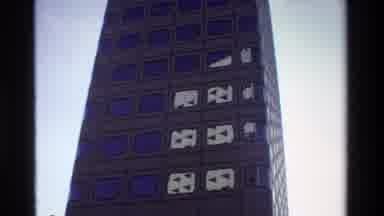 Hong Kong (1984): Large Brown Building With A Fountain In Front Of It