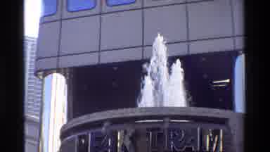 Hong Kong (1984): A Beautiful Fountain In Front Of A Building In A City