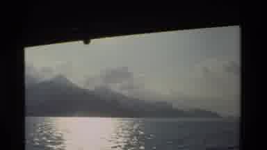 Hong Kong (1984): Cruising Past The Mountains And Approaching A Cruise Ship On